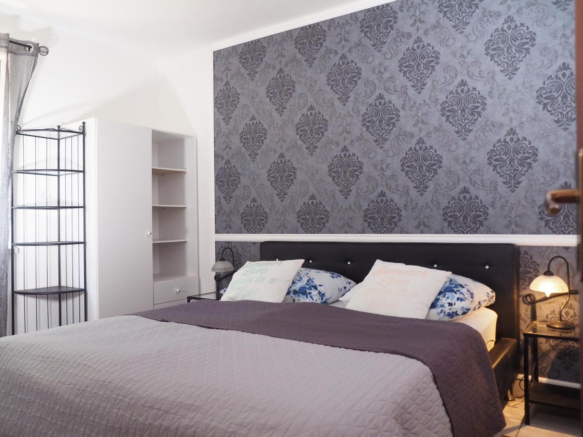 Dea Apartments PUY Quarto foto