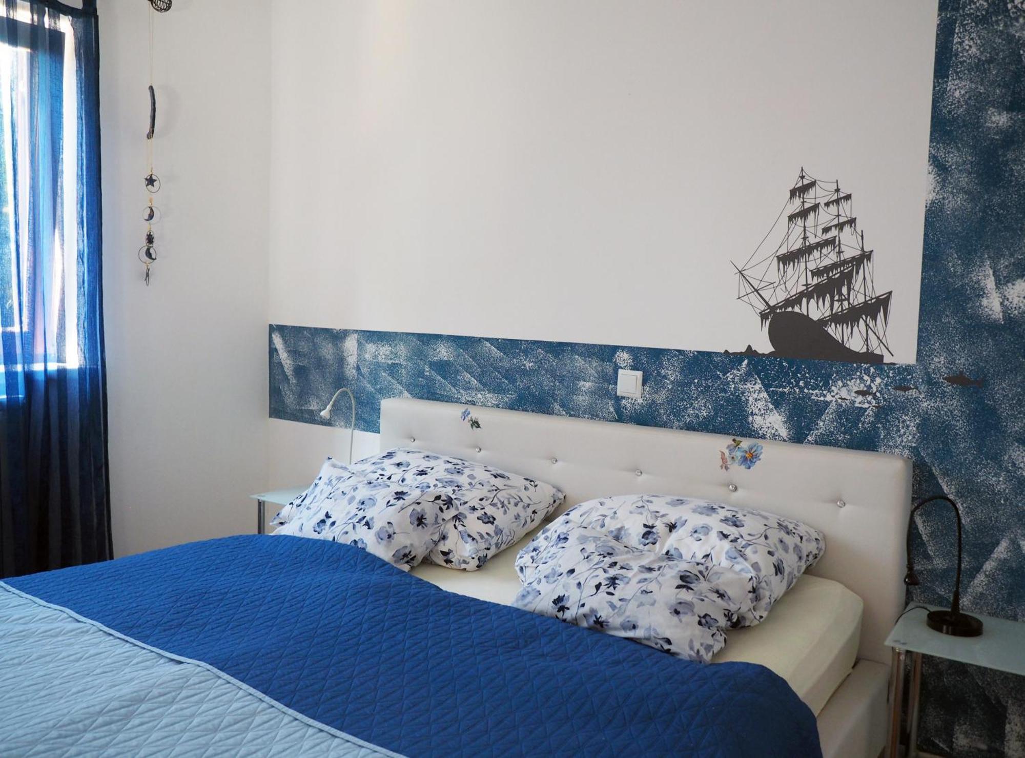 Dea Apartments PUY Quarto foto